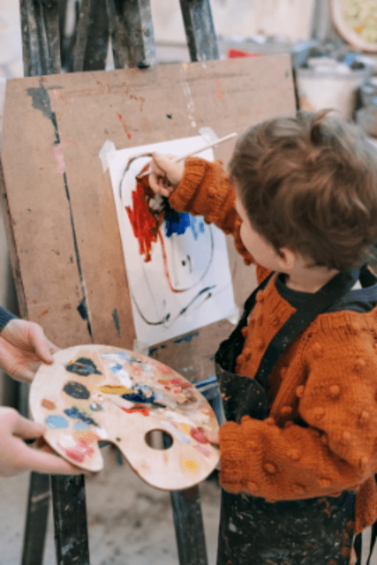 little boy painting